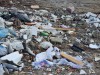 BAKANLIĞIN UYARISINA RAĞMEN ARAZİYE DÖKÜLEN ÇÖPLERİ TOPLAMAYAN BELEDİYEYE CEZA