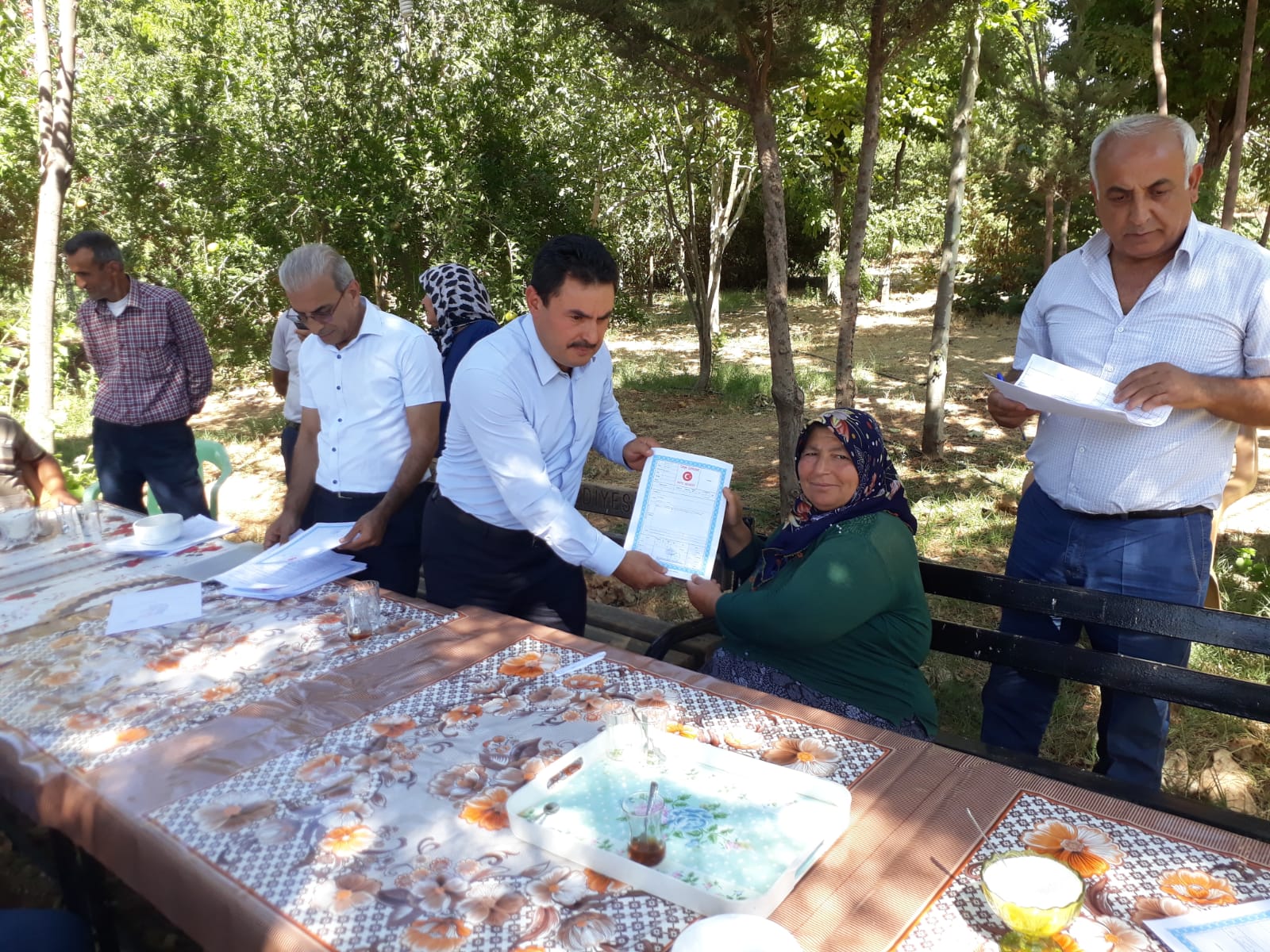 DOĞANPINAR BARAJI YAPIMI NEDENİYLE EVLERİ BARAJ GÖLETİ ALTINDA KALAN YENİ YERLEŞİM YERİNE AİT TAPULAR DAĞITILDI